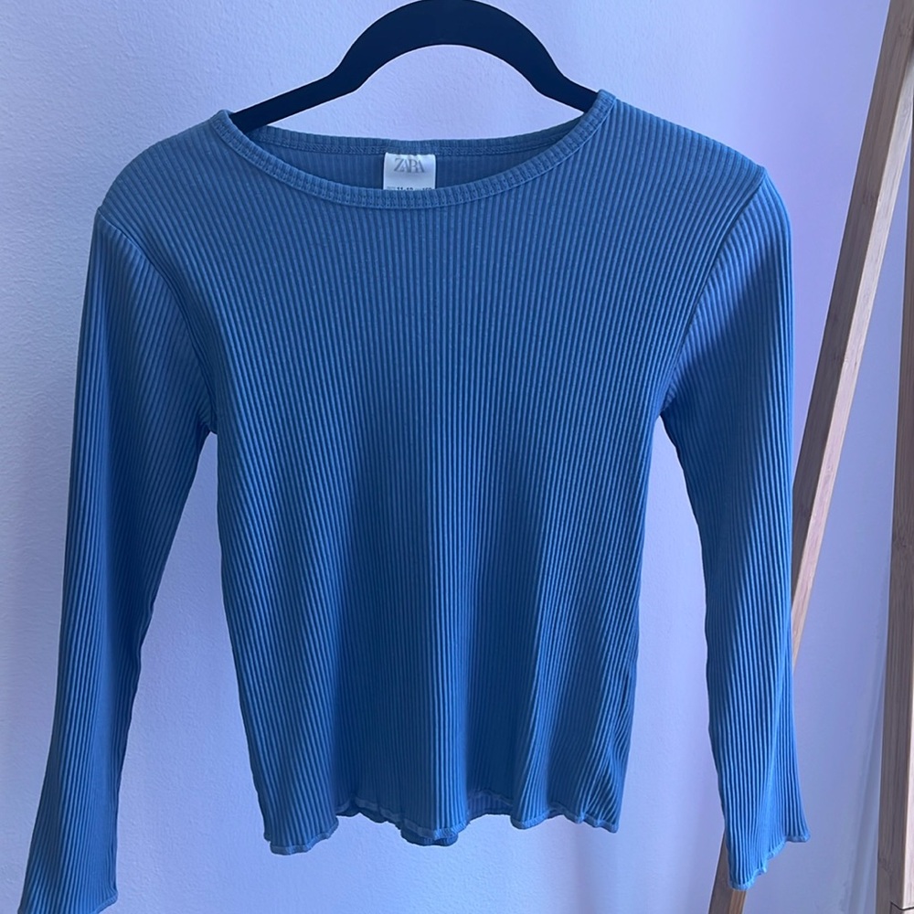 Long sleeve Zara shirt.Size 11-12 for kids.color is a grey blue